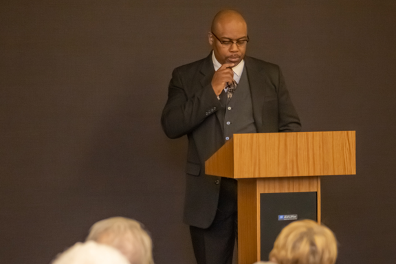 Greg Carr onstage as James Milton Turner
