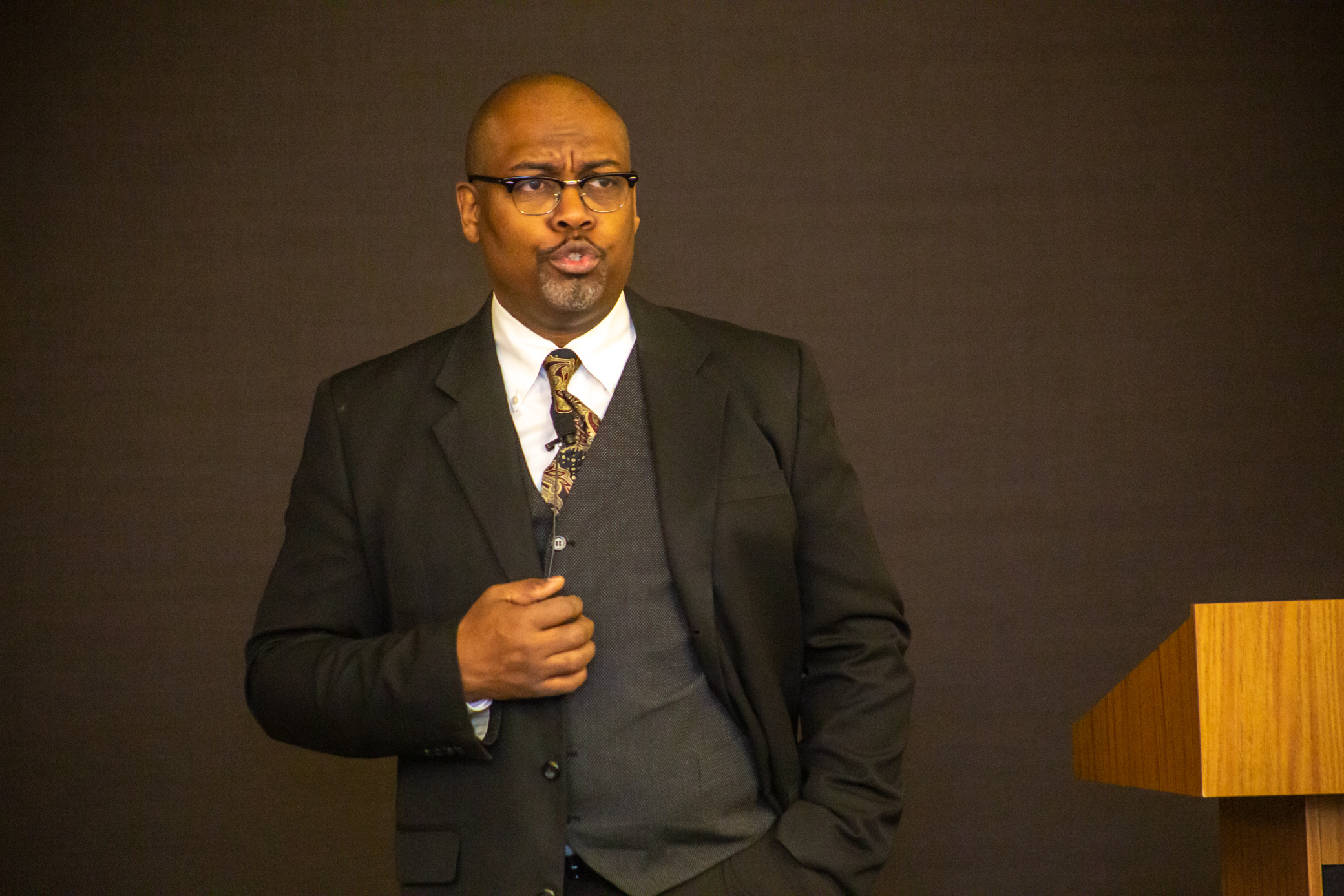 Greg Carr onstage as James Milton Turner